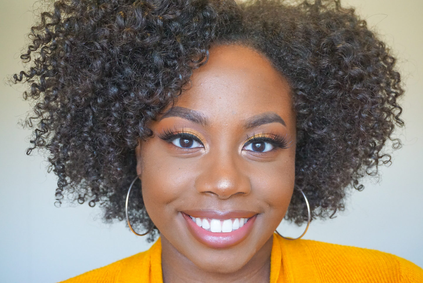 Curlycurvyandfit smiling with eyelook created with ItsMyRayeRaye x BH Cosmetics